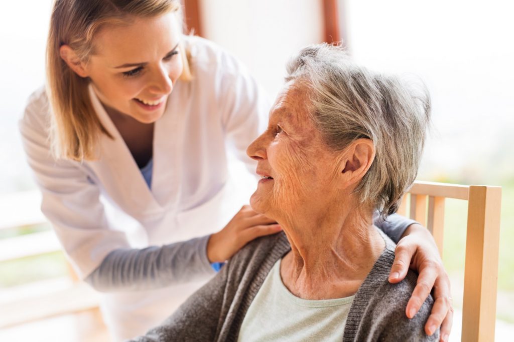 Caregiver and a senior woman during respite care