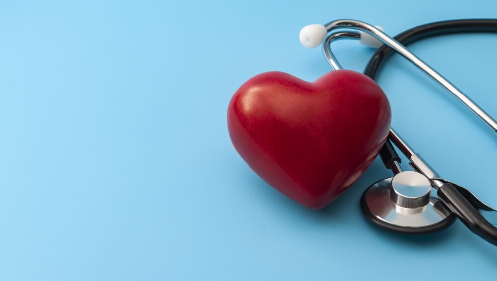 Concept of heart health with a heart and stethoscope