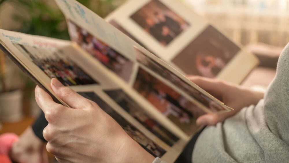 Woman looking through photo album