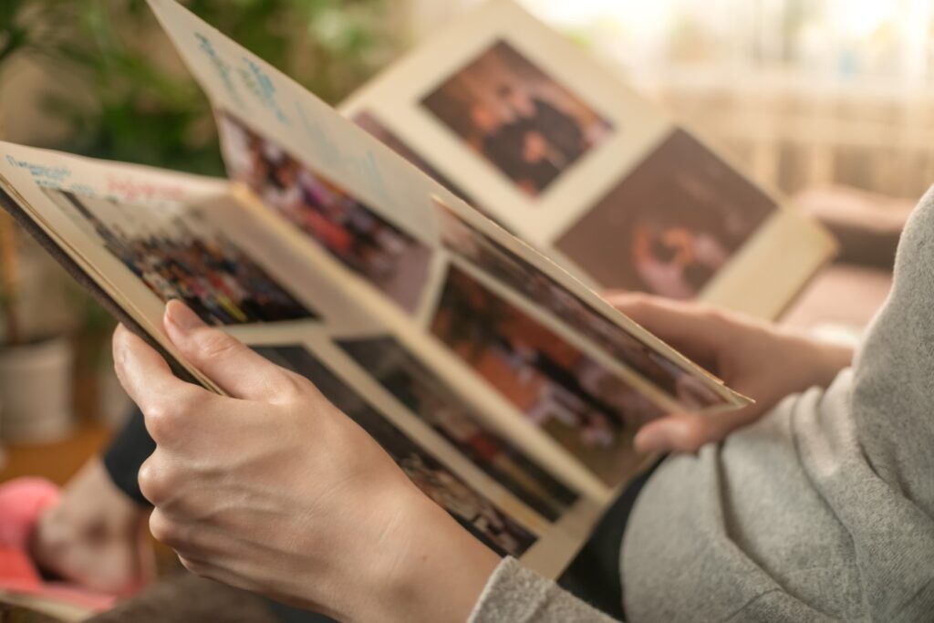 Woman looking through photo album