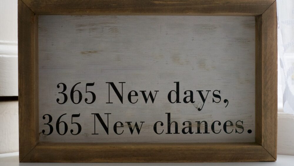 Sign that says "365 New days. 365 New chances."