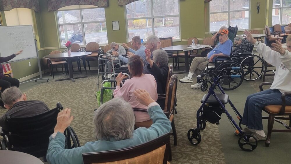 Manoogian Manor residents with limited mobility exercising